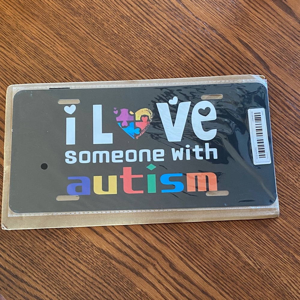 Source Unknown Multicolor Autism Support License Plate